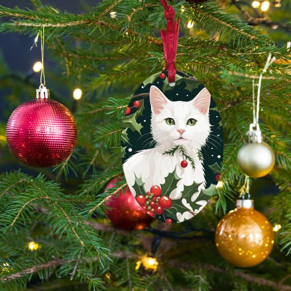 Custom cat ornament, wooden ornament of a Christmas cat surrounded by boughs of holly, hanging on a Christmas tree